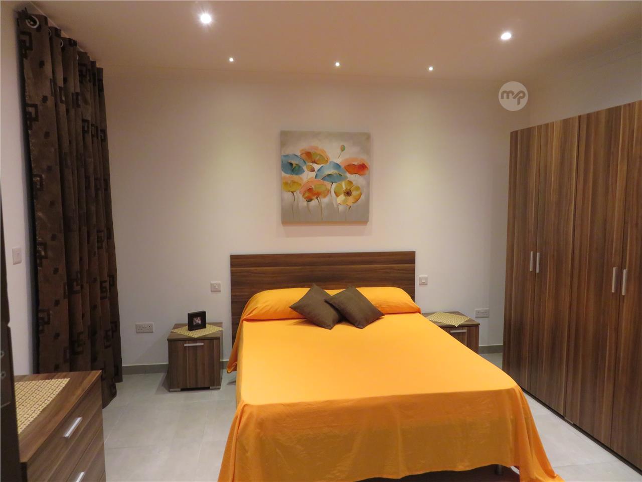 TWO BEDROOMS GROUND FLOOR WITH LARGE BACK YARD AND FRONT PATIO BUGIBBA Maltapark