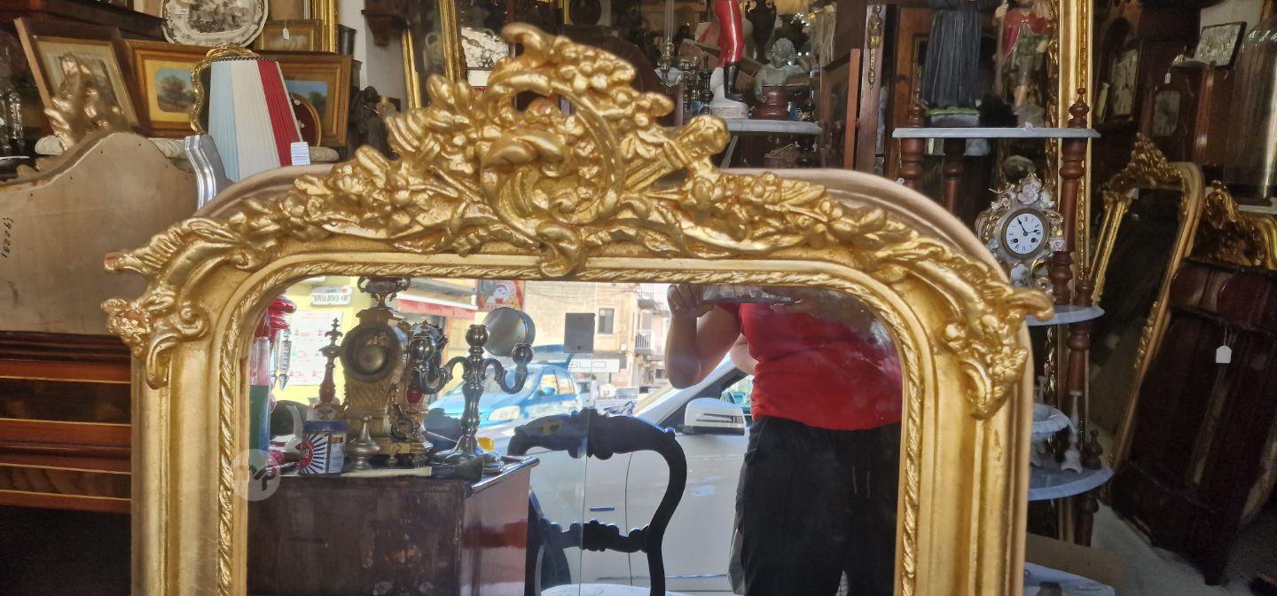 Pair Elegant Carved gilded mirrors . Measures 80 x 130 cms. Price of