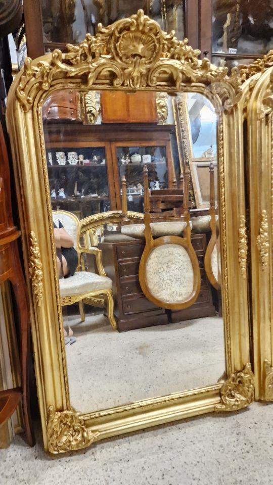 Pair Beautiful Gilded mirrors. Measures 130 x 85 cms wide. 350 euros